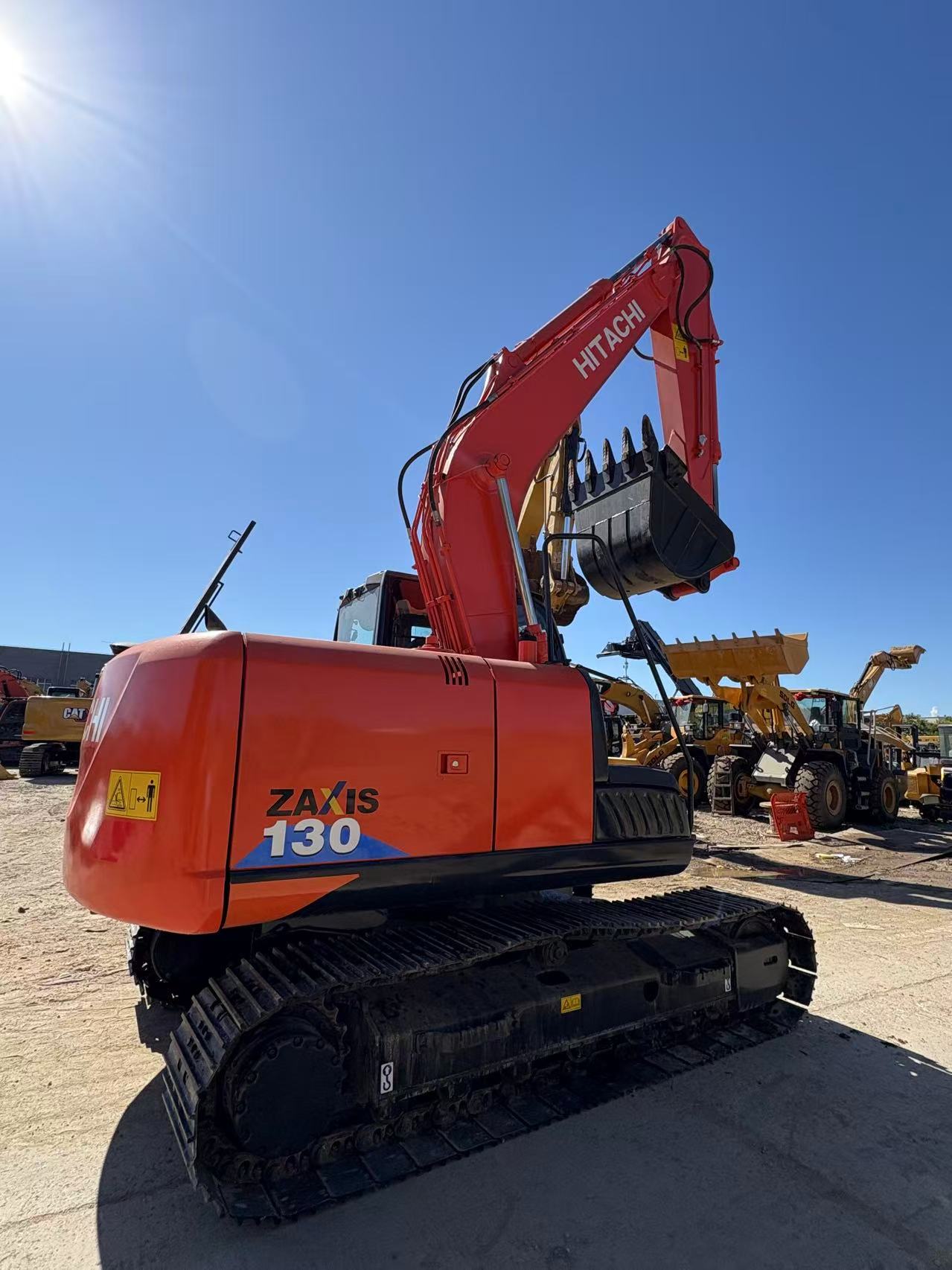 Used Excavator inspection and evaluation on job site